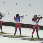
              Tiril Eckhoff of Norway (11), Ingrid Landmark Tandrevold of Norway (5) and Lisa Theresa Hauser of Austria (4) shoot during the women's 10-kilometer pursuit race at the 2022 Winter Olympics, Sunday, Feb. 13, 2022, in Zhangjiakou, China. (AP Photo/Kirsty Wigglesworth)
            
