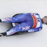 
              Emily Sweeney of United States speeds down the track during her first run of the Luge World Cup women race in Sigulda, Latvia, Sunday, Jan. 9, 2022. (AP Photo/Roman Koksarov)
            