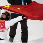 
              China's Xu Mengtao celebrates after winning a gold medal in the women's aerials finals at the 2022 Winter Olympics, Monday, Feb. 14, 2022, in Zhangjiakou, China. (AP Photo/Lee Jin-man)
            