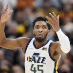 
              Utah Jazz guard Donovan Mitchell (45) reacts after scoring against the Golden State Warriors during the first half of an NBA basketball game Wednesday, Feb. 9, 2022, in Salt Lake City. (AP Photo/Rick Bowmer)
            