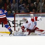 
              Detroit Red Wings' goalie Thomas Greiss makes a save against New York Rangers' Filip Chytil (72) during the shootout in an NHL hockey game Thursday, Feb. 17, 2022, in New York. The Red Wings won 3-2. (AP Photo/John Munson)
            
