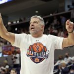 
              Auburn head coach Bruce Pearl fires up the fans during the second half of an NCAA college basketball game Texas A&M Saturday, Feb. 12, 2022, in Auburn, Ala. (AP Photo/Butch Dill)
            