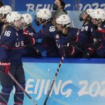 
              United States' Hayley Scamurra (16) is congratulated after scoring a goal against Finland during a women's semifinal hockey game at the 2022 Winter Olympics, Monday, Feb. 14, 2022, in Beijing. (AP Photo/Petr David Josek)
            