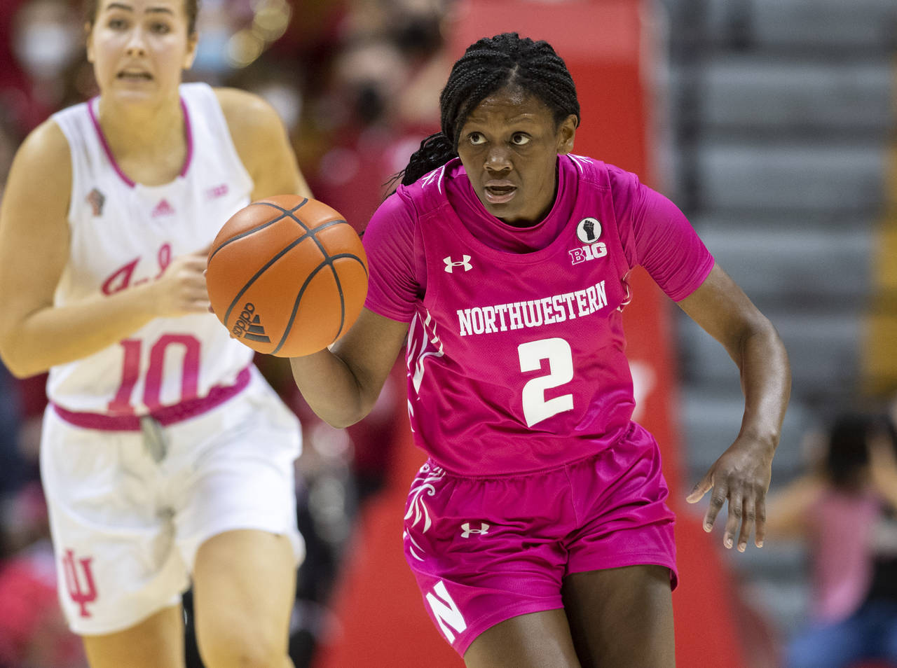Northwestern guard Lauryn Satterwhite (2) brings the ball up during the first half of the team's NC...