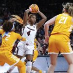 
              South Carolina's Aliyah Boston (4) passes the ball as Tennessee's Alexus Dye (2) and Tess Darby (21) pressure during the second half of an NCAA college basketball game Sunday, Feb, 20, 2022, in Columbia, S.C. (Tracy Glantz/The State via AP)
            