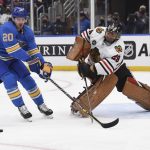 
              St. Louis Blues left wing Brandon Saad (20) attempts to block a pass from Chicago Blackhawks goaltender Marc-Andre Fleury during the second period of an NHL hockey game Saturday, Feb. 12, 2022, in St. Louis. (AP Photo/Joe Puetz)
            