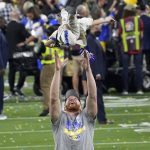 
              Los Angeles Rams punter Johnny Hekker (6) tosses his daughter in the air after the NFL Super Bowl 56 football game Cincinnati Bengals, Sunday, Feb. 13, 2022, in Inglewood, Calif. The Los Angeles Rams won 23-20. (AP Photo/Ted S. Warren)
            