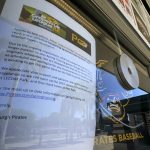 
              A note on a ticket window on Sunday, Feb. 27, 2022 at LECOM Park, the Spring Training home of the Pittsburgh Pirates, in Bradenton, Fla., informs fans that Major League Baseball has canceled Grapefruit League games until at least March 8, 2022.
            