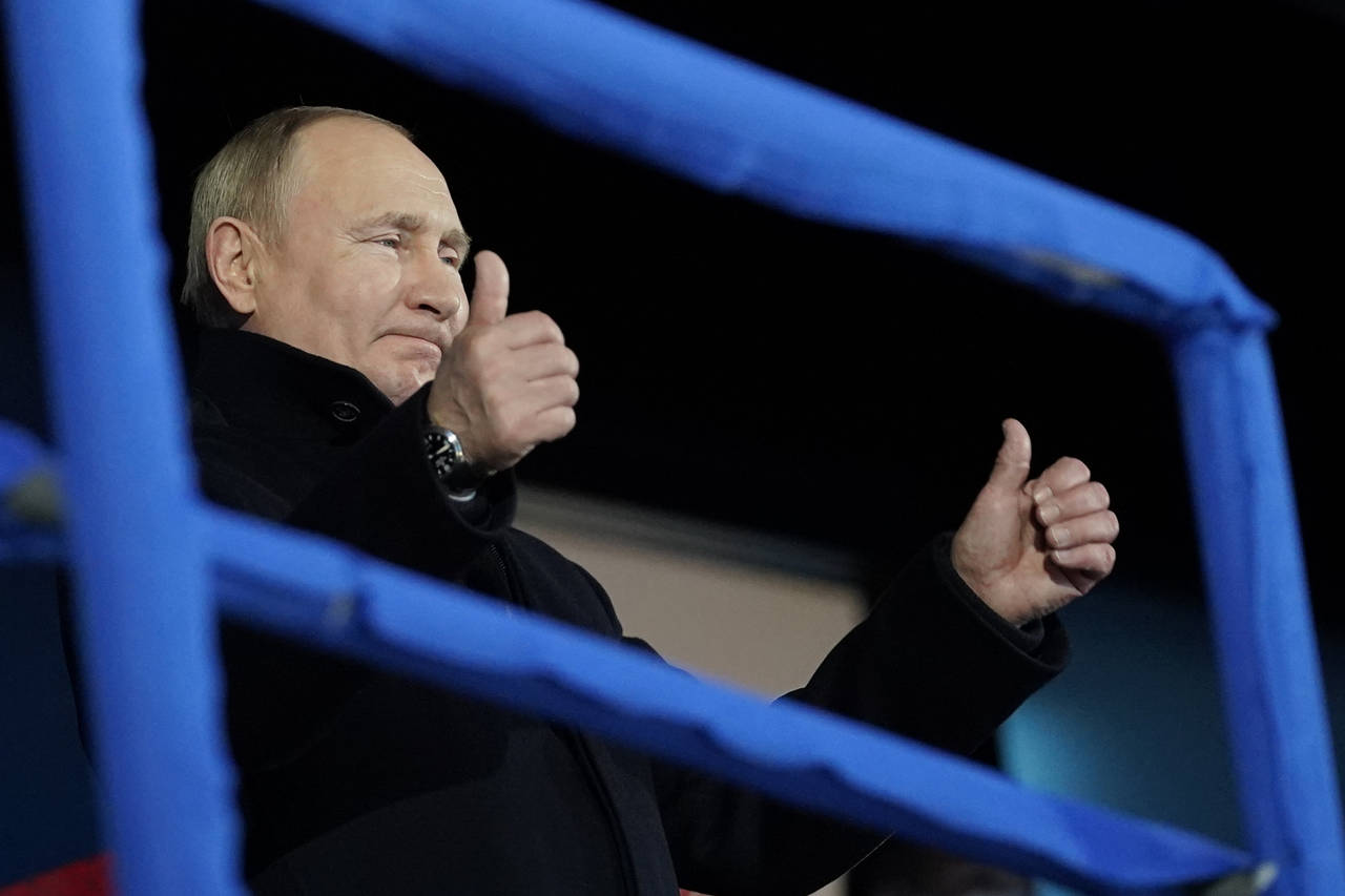 FILE - Russian President Vladimir Putin attends the opening ceremony of the 2022 Winter Olympics, F...