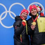 
              Francesco Friedrich and Thorsten Margis, of Germany, celebrate winning the gold medal in the 2-man at the 2022 Winter Olympics, Tuesday, Feb. 15, 2022, in the Yanqing district of Beijing. (AP Photo/Dmitri Lovetsky)
            