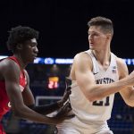 
              Penn State forward John Harrar, right, makes his way to the basket during an NCAA college basketball game against Nebraska, Sunday, Feb. 27, 2022, in State College, Pa. (Noah Riffe/Centre Daily Times via AP)
            