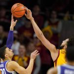 
              Iowa State forward George Conditt IV blocks a shot by Kansas State guard Mike McGuirl, left, during the first half of an NCAA college basketball game, Saturday, Feb. 12, 2022, in Ames, Iowa. (AP Photo/Charlie Neibergall)
            
