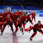 
              Canada players celebrate with their gold medals after the women's gold medal hockey game at the 2022 Winter Olympics, Thursday, Feb. 17, 2022, in Beijing. (AP Photo/Matt Slocum)
            