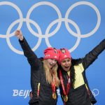 
              Laura Nolte and Deborah Levi, of Germany, celebrate winning the gold medal in the women's bobsleigh at the 2022 Winter Olympics, Saturday, Feb. 19, 2022, in the Yanqing district of Beijing. (AP Photo/Pavel Golovkin)
            