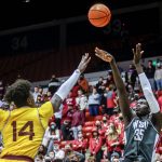 Washington State forward Mouhamed Gueye (35) shoots the ball as Arizona State center Enoch Boakye (14) defends during the first half of an NCAA college basketball game Saturday, Feb. 12, 2022, in Pullman, Wash. (AP Photo/August Frank)