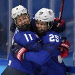 
              United States' Alex Carpenter (25) celebrates with Abby Roque (11) after Carpenter scored a goal against Canada during a preliminary round women's hockey game at the 2022 Winter Olympics, Tuesday, Feb. 8, 2022, in Beijing. (AP Photo/Petr David Josek)
            