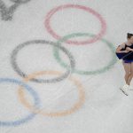 
              Mariah Bell, of the United States, competes in the women's short program during the figure skating at the 2022 Winter Olympics, Tuesday, Feb. 15, 2022, in Beijing. (AP Photo/Jeff Roberson)
            
