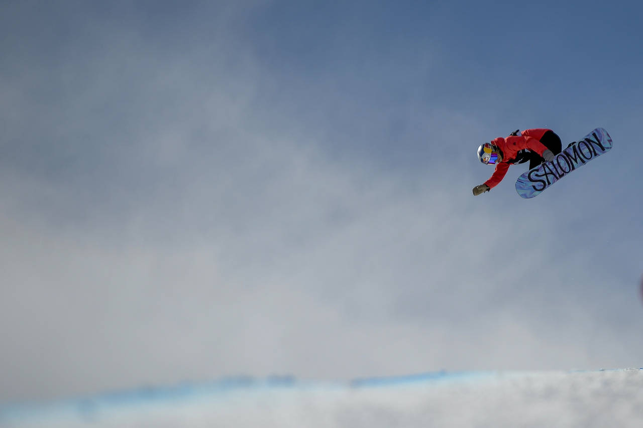 FILE- Maddie Mastro, of the United States, competes in the women's snowboard halfpipe final at the ...