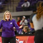 
              Clemson head coach Amanda Butler argues with an official as her team plays against Louisville in the first quarter of an NCAA college basketball game in Clemson, N.C., Thursday, Feb. 3, 2022. (AP Photo/Nell Redmond)
            
