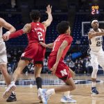
              Penn State guard Jalen Pickett (22) passes the ball during an NCAA college basketball game against Nebraska, Sunday, Feb. 27, 2022, in State College, Pa. (Noah Riffe/Centre Daily Times via AP)
            