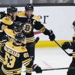 
              Boston Bruins right wing David Pastrnak (88) is congratulated after his goal during the third period of an NHL hockey game against the Seattle Kraken, Tuesday, Feb. 1, 2022, in Boston. (AP Photo/Charles Krupa)
            