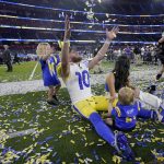 
              Los Angeles Rams wide receiver Cooper Kupp (10) celebrates with his family after the Rams defeated the Cincinnati Bengals in the NFL Super Bowl 56 football game Sunday, Feb. 13, 2022, in Inglewood, Calif. (AP Photo/Mark J. Terrill)
            