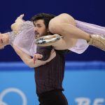 
              Madison Hubbell and Zachary Donohue, of the United States, perform their routine in the ice dance competition during the figure skating at the 2022 Winter Olympics, Monday, Feb. 14, 2022, in Beijing. (AP Photo/David J. Phillip)
            