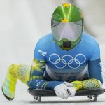 
              Jaclyn Narracott, of Australia, finishes the women's skeleton run 2 at the 2022 Winter Olympics, Friday, Feb. 11, 2022, in the Yanqing district of Beijing. (AP Photo/Mark Schiefelbein)
            