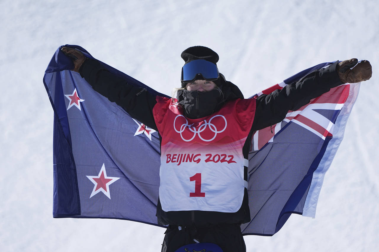 New Zealand's Zoi Sadowski Synnott celebrates after winning a gold medal in the women's slopestyle ...