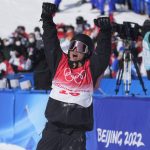 
              China's Su Yiming reacts as he competes during men's slopestyle finals at the 2022 Winter Olympics, Monday, Feb. 7, 2022, in Zhangjiakou, China. (AP Photo/Lee Jin-man)
            