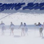 
              Skiers compete in blustery conditions during the women's 30km mass start free cross-country skiing competition at the 2022 Winter Olympics, Sunday, Feb. 20, 2022, in Zhangjiakou, China. (AP Photo/Aaron Favila)
            
