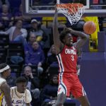 
              Mississippi center Nysier Brooks (3) dunks against LSU during the first half of an NCAA college basketball game in Baton Rouge, La., Tuesday, Feb. 1, 2022. (AP Photo/Matthew Hinton)
            