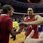 
              Texas Tech forward Marcus Santos-Silva (14) celebrates with fans after the team's win over Texas in an NCAA college basketball game, Saturday, Feb. 19, 2022, in Austin, Texas. (AP Photo/Eric Gay)
            