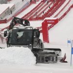 
              A snow plough clears snow from the course after the second run of the men's giant slalom was delayed due to a heavy snowfall at the 2022 Winter Olympics, Sunday, Feb. 13, 2022, in the Yanqing district of Beijing. (AP Photo/Alessandro Trovati)
            