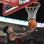 
              Tulane forward Tylan Pope (33) shoots a layup against Houston during the first half of an NCAA college basketball game Wednesday, Feb. 2, 2022, in Houston. (AP Photo/Justin Rex)
            