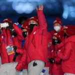 
              Athletes from Japan wave during the closing ceremony of the 2022 Winter Olympics, Sunday, Feb. 20, 2022, in Beijing. (AP Photo/Jae C. Hong)
            