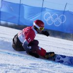 
              Slovenia's Zan Kosir competes during the men's parallel giant slalom finals at the 2022 Winter Olympics, Tuesday, Feb. 8, 2022, in Zhangjiakou, China. (AP Photo/Lee Jin-man)
            