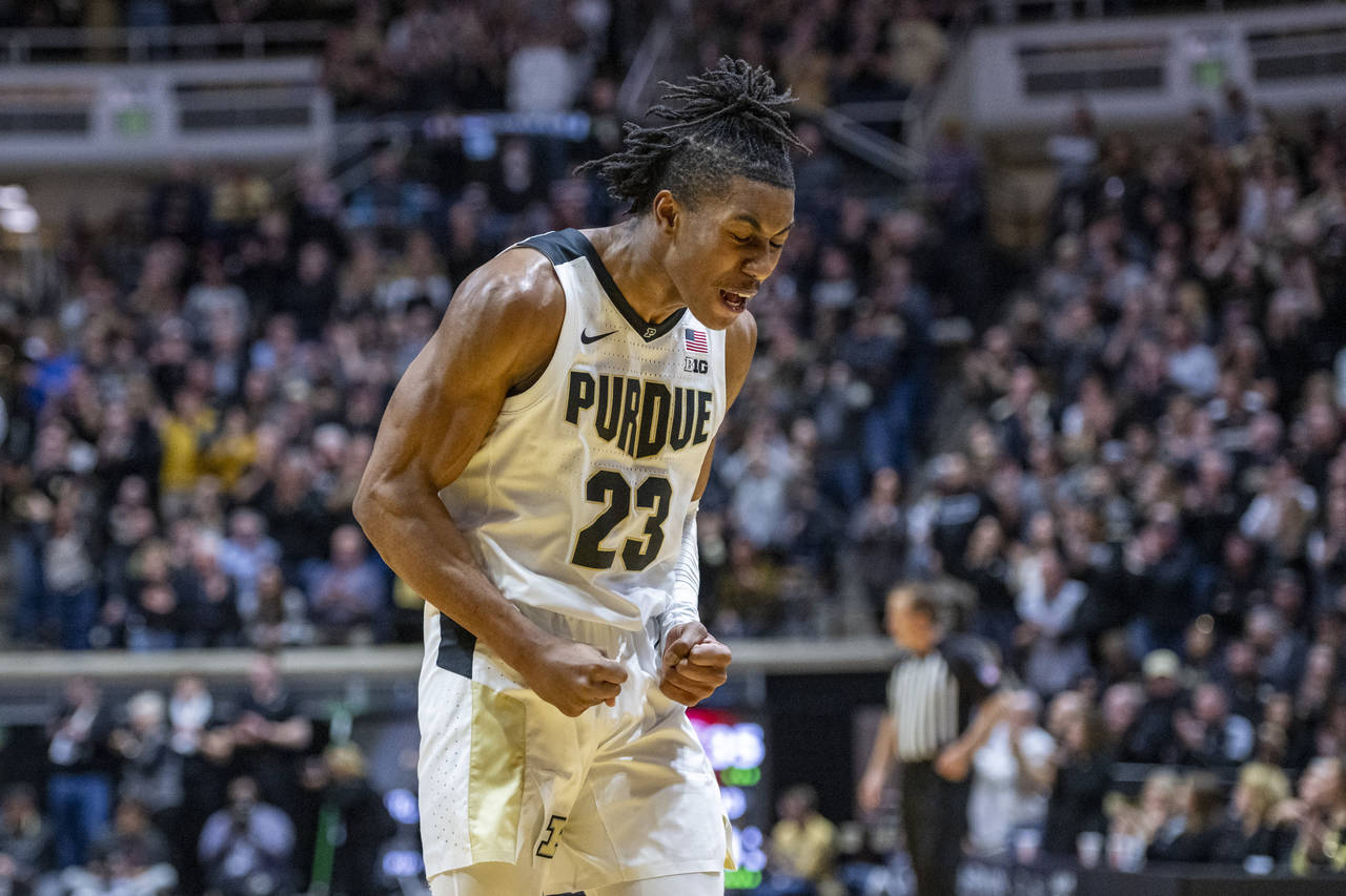 Purdue guard Jaden Ivey (23) reacts during the first half of an NCAA college basketball game agains...