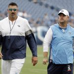 
              FILE - Tennessee Titans head coach Mike Vrabel, left, and general manager Jon Robinson walk on the field at Nissan Stadium during NFL football training camp on Aug. 3, 2019, in Nashville, Tenn. The Titans announced Tuesday, Feb. 8, 2022, that they have extended the contracts of general manager Jon Robinson and coach Mike Vrabel to keep them around for years to come. (AP Photo/Mark Humphrey, File)
            