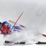 
              Camille Cerutti, of France crashes during the women's downhill at the 2022 Winter Olympics, Tuesday, Feb. 15, 2022, in the Yanqing district of Beijing. (AP Photo/Alessandro Trovati)
            