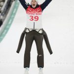 
              Ursa Bogataj, of Slovenia, celebrates after winning gold in the women's normal hill individual ski jumping event at the 2022 Winter Olympics, Saturday, Feb. 5, 2022, in Zhangjiakou, China. (AP Photo/Andrew Medichini)
            