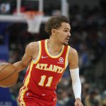 
              Atlanta Hawks guard Trae Young (11) dribbles during the first quarter of an NBA basketball game against the Dallas Mavericks in Dallas, Sunday, Feb. 6, 2022. (AP Photo/LM Otero)
            
