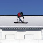 
              An Australian skateboarder trains on the slopestyle course ahead of ahead of the 2022 Winter Olympics, Wednesday, Feb. 2, 2022, in Zhangjiakou, China. (AP Photo/Gregory Bull)
            