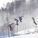 
              FILE - Gold medalist Pierre Vaultier of France, left, leads, from second left to right, silver medalist Nikolai Olyunin of Russia, Paul­Henri de le Rue of France, and bronze medalist Alex Deibold of the United States, in the men's snowboard cross final at the Rosa Khutor Extreme Park, at the 2014 Winter Olympics, Feb. 18, 2014, in Krasnaya Polyana, Russia.  Deibold suffered a head injury in a crash during qualifying at a World Cup event just days before his arrival in China. His absence hit his teammates’ hard. (AP Photo/Sergei Grits, File)
            