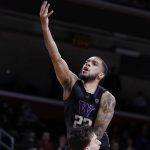 
              Washington guard Terrell Brown Jr. goes up for a layup against Southern California forward Harrison Hornery, but is called for an offensive foul during the first half of an NCAA college basketball game in Los Angeles, Thursday, Feb. 17, 2022. (AP Photo/Alex Gallardo)
            