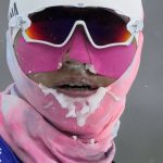 
              The face of China's Chen Degen is covered in ice after the men's weather-shortened 50km mass start free cross-country skiing competition at the 2022 Winter Olympics, Saturday, Feb. 19, 2022, in Zhangjiakou, China. (AP Photo/Aaron Favila)
            