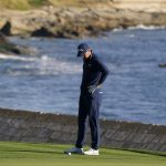 
              Jordan Spieth looks at his ball just off the 18th green of the Pebble Beach Golf Links during the final round of the AT&T Pebble Beach Pro-Am golf tournament in Pebble Beach, Calif., Sunday, Feb. 6, 2022. (AP Photo/Eric Risberg)
            