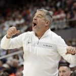 
              Auburn coach Bruce Pearl reacts to a call during the second half of the team's NCAA college basketball game against Alabama on Tuesday, Feb. 1, 2022, in Auburn, Ala. (AP Photo/Butch Dill)
            