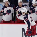 
              Columbus Blue Jackets left wing Patrik Laine (29) celebrates with teammates after scoring against the Chicago Blackhawks during the third period of an NHL hockey game in Chicago, Thursday, Feb. 17, 2022. (AP Photo/Nam Y. Huh)
            