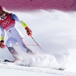 
              Mikaela Shiffrin of United States looks down after skiing off course during the first run of the women's giant slalom at the 2022 Winter Olympics, Monday, Feb. 7, 2022, in the Yanqing district of Beijing. A bad turn in the giant slalom Monday knocked the American star out of that event on the opening run. Her next chance at a medal is the slalom. Shiffrin won the slalom at the 2014 Olympic Games and is a four-time world champion in the event. (AP Photo/Robert F. Bukaty)
            